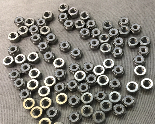 Titanium Gr5 Machined Lock Nuts with 6 Point Stamp Nuts.jpg